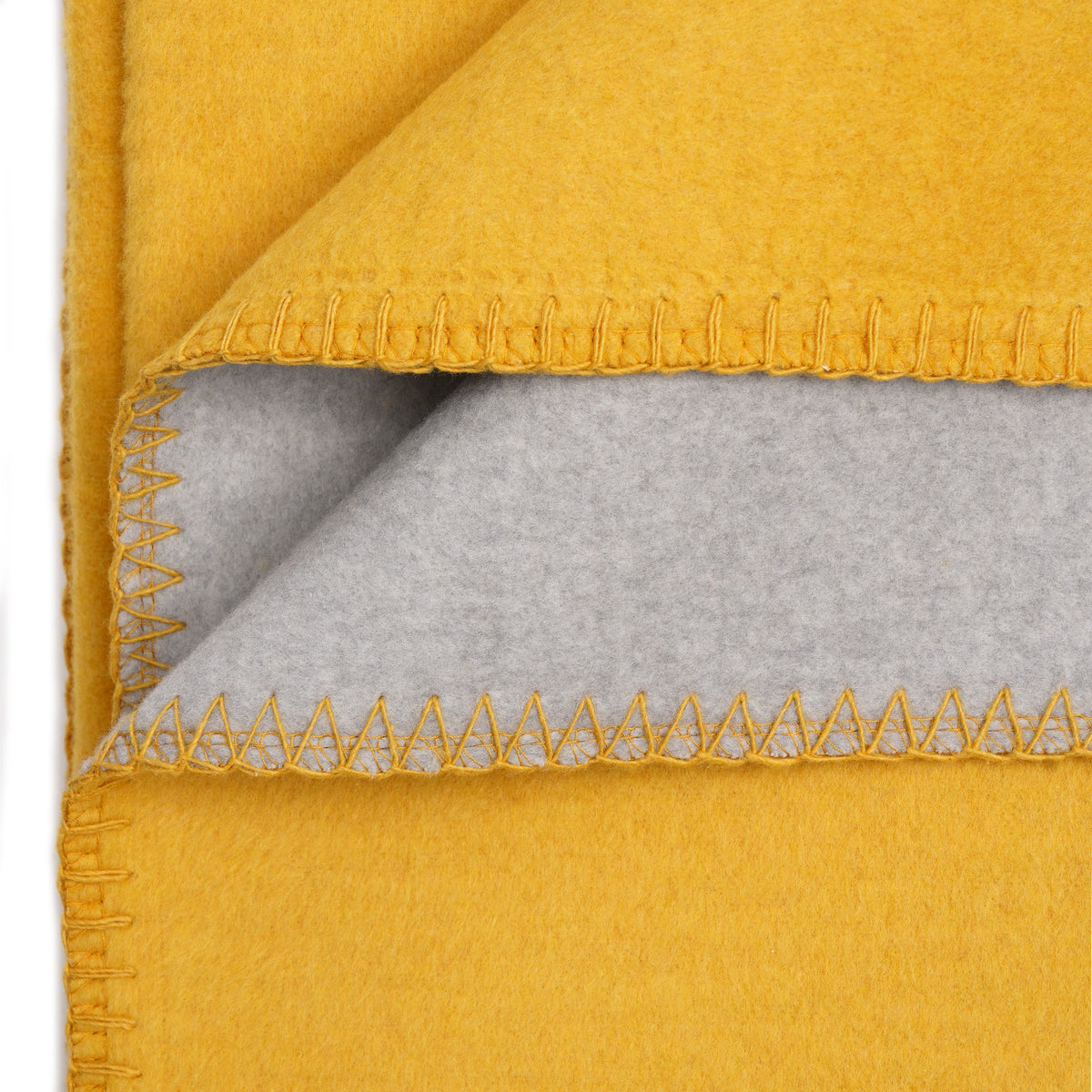 Flauschige Baumwoll Wendedecke zweifarbig - regional hergestellt honeygold / grau melange 150 x 200 cm